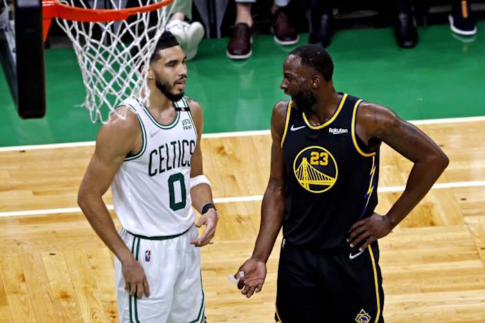 Jun 8, 2022; Boston, Massachusetts, USA; Boston Celtics forward Jayson Tatum (0) talks with Golden State Warriors forward Draymond Green (23) during the second quarter in game three of the 2022 NBA Finals at TD Garden. Mandatory Credit: Winslow Townson-USA TODAY Sports
